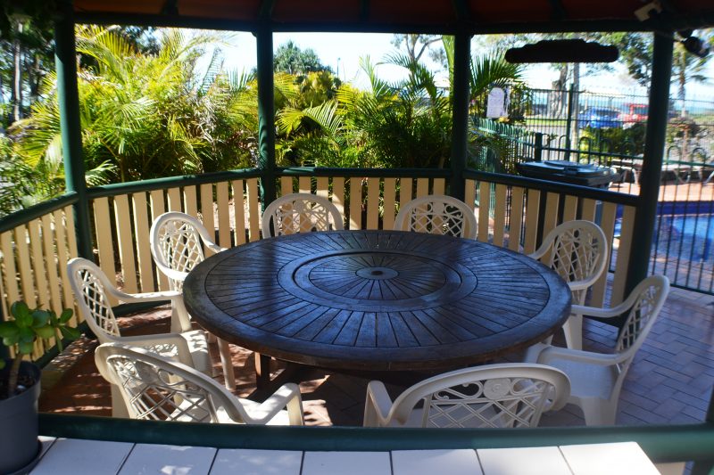 Gazebo seating, pool & Beach view Charlton Apartments Charlton